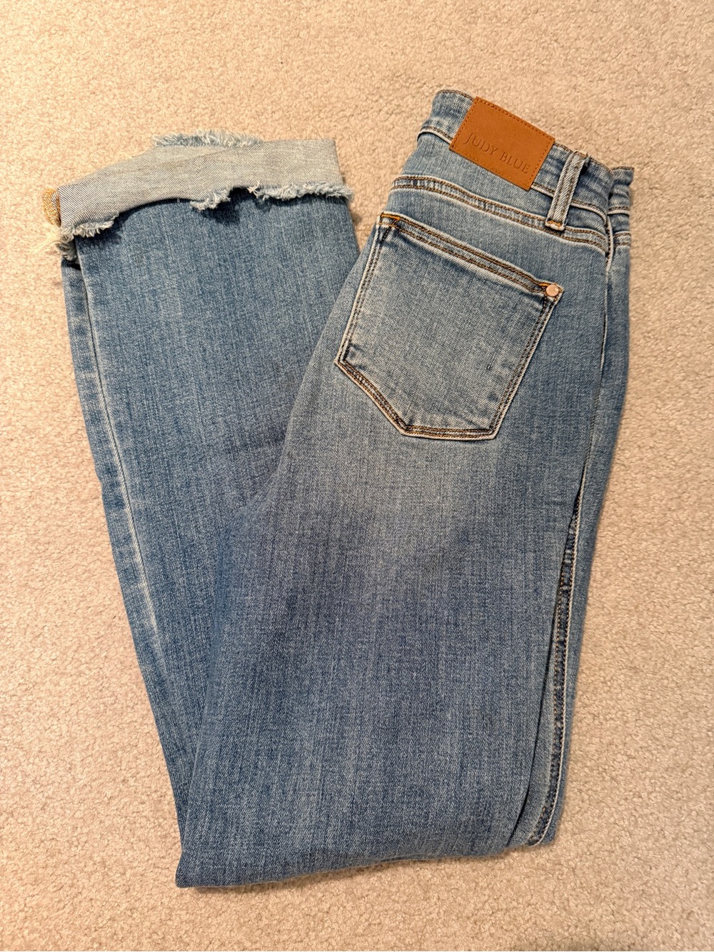 Judy Blue Light Wash Distressed High-Rise Raw Hem Jeans